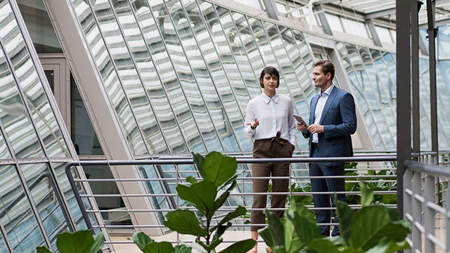 internal office picture with corporate man and woman